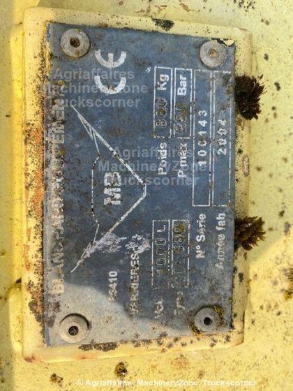 Godet à déversement latéral pour tractopelle CASE